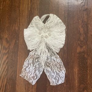 Handmade lace bows with crystal & pearl center!